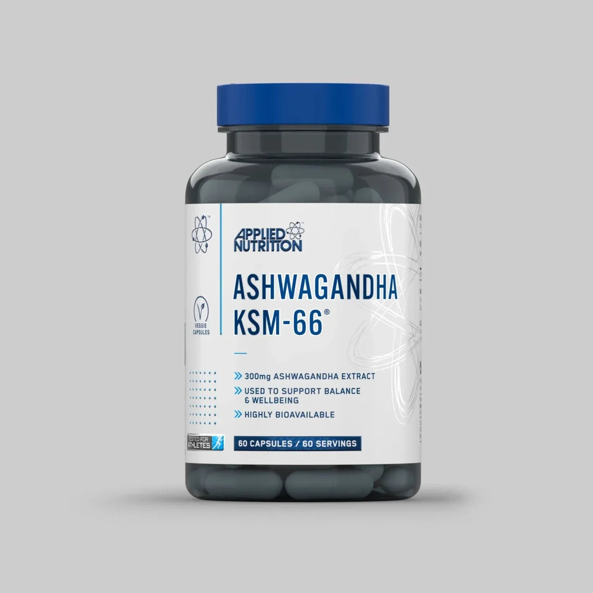 Bottle of Applied Nutrition Ashwagandha KSM-66 supplement on a gray background